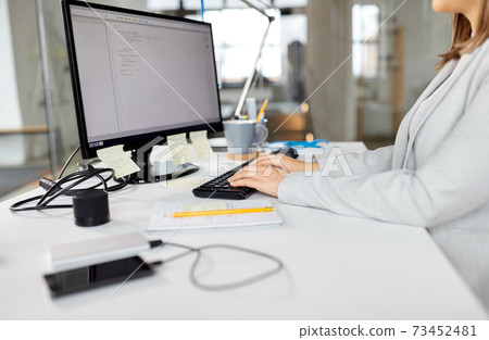 businesswoman with computer working at office businesswoman with computer working at office 73452481