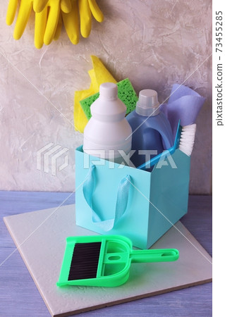 Liquid detergents in plastic bottles, packaging of home cleaning products on the table Liquid detergents in plastic bottles, packaging of home cleaning products on the table 73455285