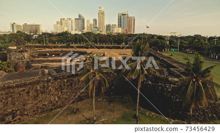 Designed park landscape aerial. Modern green tropic plants and trees. Wide grass valley Designed park landscape aerial. Modern green tropic plants and trees. Wide grass valley 73456429