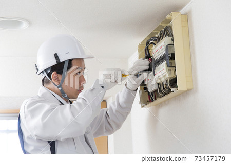 Electrical work switchboard worker 73457179