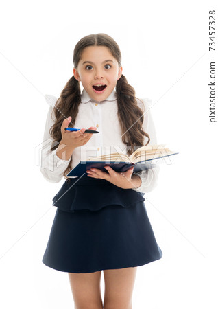 Schoolgirl with surprised look isolated on white. Little Schoolgirl with surprised look isolated on white. Little 73457328
