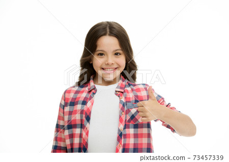 Girl smiling face feels confident. Child confidently showing Girl smiling face feels confident. Child confidently showing 73457339