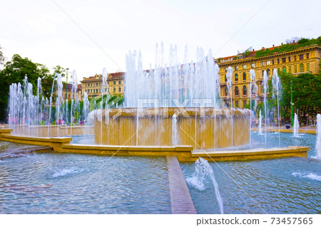 The fountain on place at Sforza Castle in day. Milan, Italy The fountain on place at Sforza Castle in day. Milan, Italy 73457565