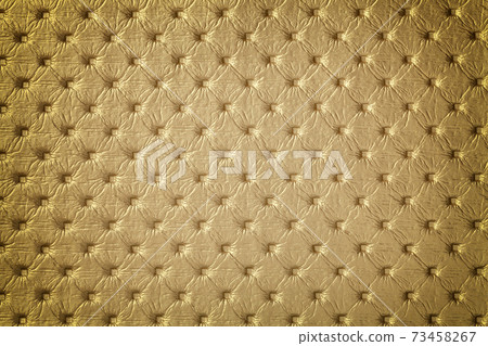 Texture of golden leather background with capitone pattern with vignette. Texture of golden leather background with capitone pattern with vignette. 73458267