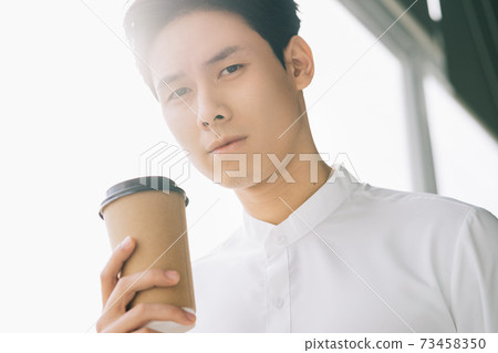 Businessman thinking Businessman thinking 73458350