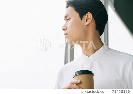 Businessman thinking Businessman thinking 73458356