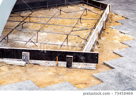 framework of reinforcement for pouring concrete steps, construction work using formwork for monolithic casting of concrete. 73458469