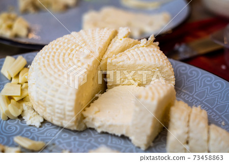 Plate with delicious soft cheese Plate with delicious soft cheese 73458863