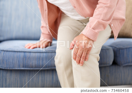 Senior women suffering from knee pain Senior women suffering from knee pain 73460458