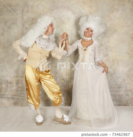 Baroque style couple dancing in the studio Baroque style couple dancing in the studio 73462987