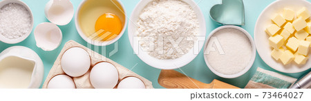 Baking or cooking background. Ingredients, kitchen items for baking. 73464027