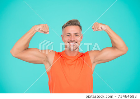 Stay strong in your life. Happy athlete show physical Stay strong in your life. Happy athlete show physical 73464688