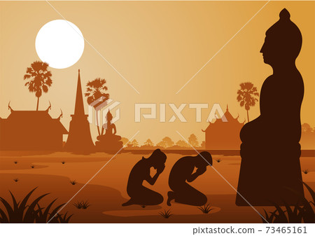 Buddhist woman and man pay respect to buddha sculpture politely with faith and belief Buddhist woman and man pay respect to buddha sculpture politely with faith and belief 73465161