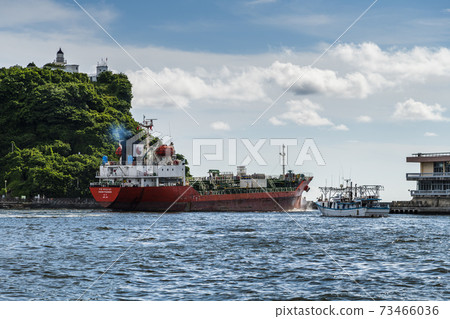 The large ship is leaving Port of Kaohsiung, Taiwan. The large ship is leaving Port of Kaohsiung, Taiwan. 73466036