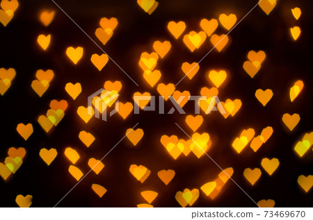 Defocused heart bokeh on christmas light background Defocused heart bokeh on christmas light background 73469670