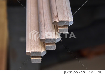 Joinery. Wooden cabinet doors. Wooden frame. Home library with classic design. Wooden furniture manufacturing process Joinery. Wooden cabinet doors. Wooden frame. Home library with classic design. Wooden furniture manufacturing process 73469705