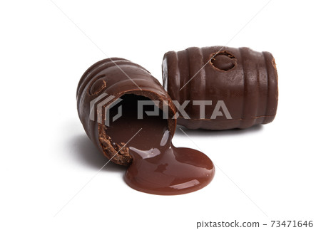 chocolate barrels with liquor isolated chocolate barrels with liquor isolated 73471646