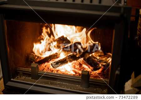 Close-up of a burning fireplace 73472289