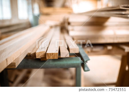 Pile of pine planks at the warehouse Pile of pine planks at the warehouse 73472551