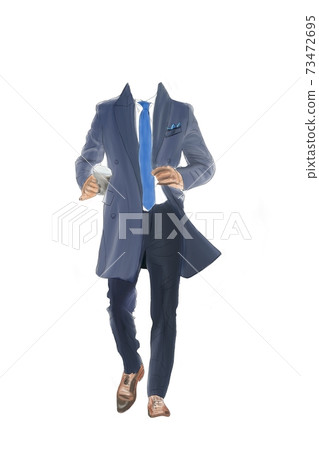businessman in a coat with a cup of coffee businessman in a coat with a cup of coffee 73472695