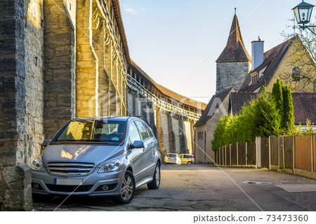 Old houses in Rothenburg ob der Tauber, picturesque medieval city in Germany, famous UNESCO world culture heritage site, popular travel destination 73473360