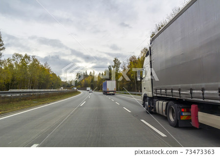 Truck on freeway road, cargo transportation concept Truck on freeway road, cargo transportation concept 73473363
