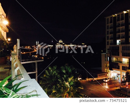 The royal palace with a night view in the distance 73475521