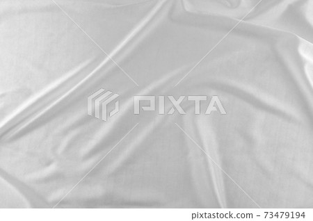 Smooth white silk or satin texture. Smooth white silk or satin texture. 73479194