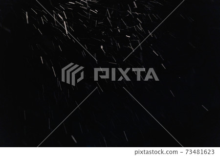 Snow falling night 73481623