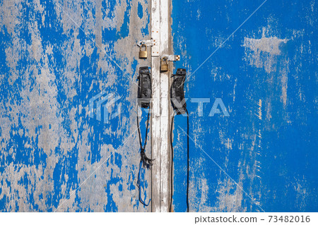 Warehouse blue door and key 73482016