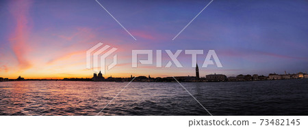 Venetian canal sunset 73482145
