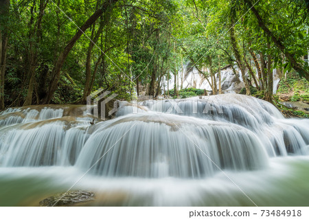 Pha Tad Waterfall, famous nature travel destination in deep forest in Kanchanaburi, Thailand Pha Tad Waterfall, famous nature travel destination in deep forest in Kanchanaburi, Thailand 73484918
