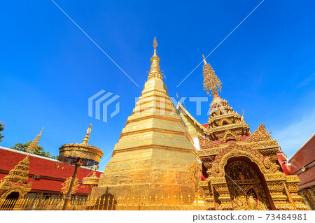 Golden pagoda for year of tiger zodiac at  Wat Prathat Cho Hae Temple in Phrae province, north of Thailand 73484981