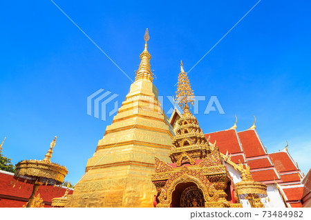 Golden pagoda for year of tiger zodiac at Wat Prathat Cho Hae Temple in Phrae province, north of Thailand Golden pagoda for year of tiger zodiac at Wat Prathat Cho Hae Temple in Phrae province, north of Thailand 73484982