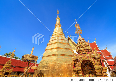 Golden pagoda for year of tiger zodiac at  Wat Prathat Cho Hae Temple in Phrae province, north of Thailand 73484984