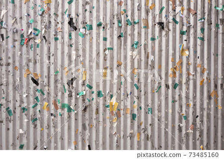 Grungy downtown wall with leaflet tape Grungy downtown wall with leaflet tape 73485160