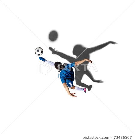 Young man soccer player isolated over white background with shadow. Top view. 73486507