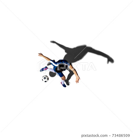 Top view of young man soccer player isolated over white background with shadow. 73486509