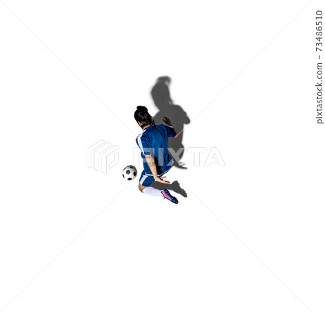 Caucasian man soccer player isolated on white background with shadow. Top view Caucasian man soccer player isolated on white background with shadow. Top view 73486510