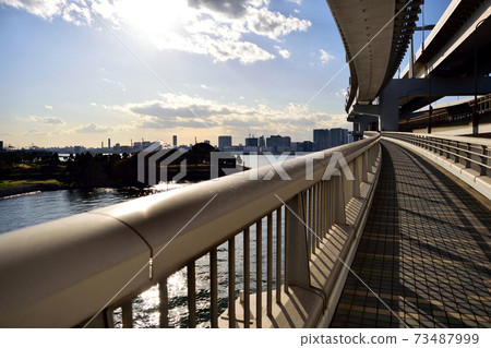 Odaiba Rainbow Bridge Sidewalk at dusk 73487999