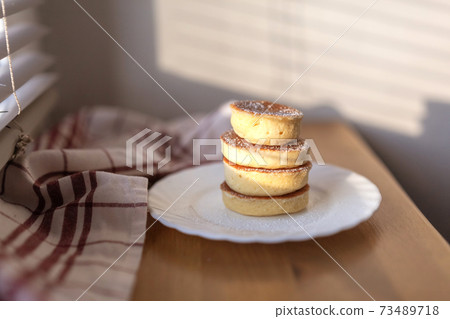 Japanese Style Dessert Fluffy Souffle Pancake closeup 73489718