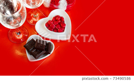 Festive dinner. Date. Red background 73490586