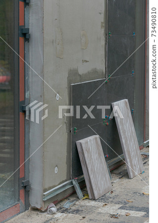 Technology insulation of old buildings. Ventilated facade of the building. Heat saving. Warm house. Technology insulation of old buildings. Ventilated facade of the building. Heat saving. Warm house. 73490810