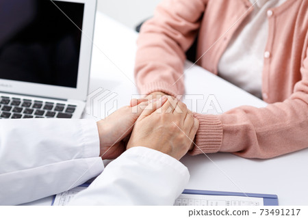 Doctor and patient support at hand Doctor and patient support at hand 73491217