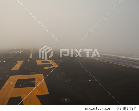 Runway where lights fell due to thick fog Runway where lights fell due to thick fog 73491487