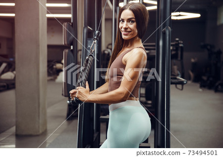 fitness woman pumping up butt booty legs muscles Stock Photo