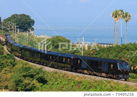 Cruise train "Nana Star" along the Ariake Sea (JR Kyushu) Cruise train "Nana Star" along the Ariake Sea (JR Kyushu) 73495238