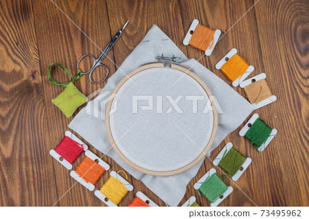 Hoop for cross stitch with stretched canvas,mockup for the designer Hoop for cross stitch with stretched canvas,mockup for the designer 73495962