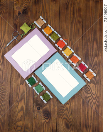 Wooden frames for cross stitch embroidery for designer mockup Wooden frames for cross stitch embroidery for designer mockup 73496007