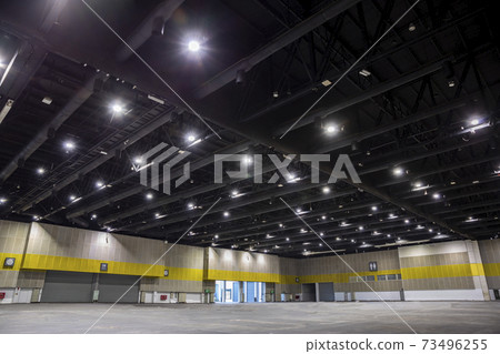 HVAC Duct Cleaning, Ventilation pipes in silver insulation material hanging from the ceiling inside new building warehouse. HVAC Duct Cleaning, Ventilation pipes in silver insulation material hanging from the ceiling inside new building warehouse. 73496255